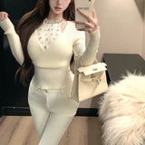 ビジュー付きホルターネックニット（2COLOR）AT1403